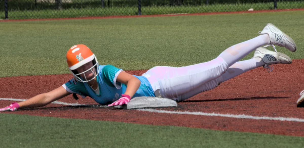 Hailey reaching the base on a headfirst slide
